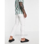 DESIGN skinny jeans in white with rips and raw hem