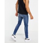 River Island skinny jeans with rip & repair in mid blue