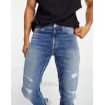 River Island skinny jeans with rip & repair in mid blue