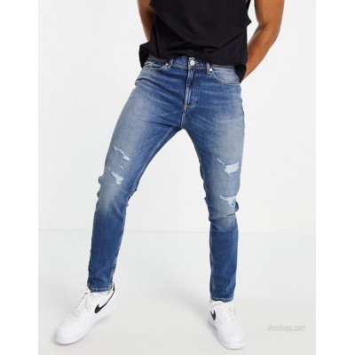 River Island skinny jeans with rip & repair in mid blue  