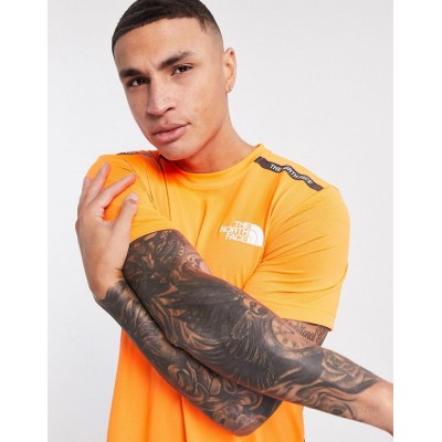The North Face Mountain Athletic t-shirt in orange  