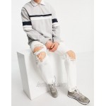 DESIGN dad fit jeans in white with heavy rips