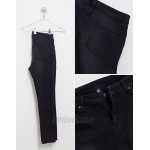 DESIGN spray on jeans in power stretch with heavy rips in washed black