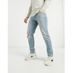 DESIGN low rise slim jeans in vintage mid 90's wash with knee rip
