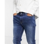 Burton Menswear tapered mid wash jeans in blue