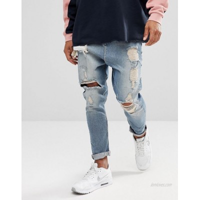  DESIGN drop crotch jeans in vintage light wash blue with heavy rips  