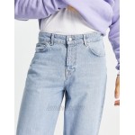 DESIGN relaxed tapered jeans in vintage light wash blue with raw hem