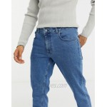 DESIGN stretch tapered jeans in retro mid wash blue