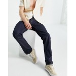Edwin Exclusive EA55 tapered fit jeans in mid wash