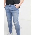DESIGN Plus super skinny jeans in light wash blue with knee rip and abrasions