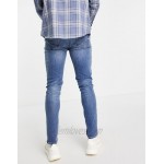DESIGN skinny jeans in mid wash blue