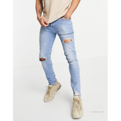  DESIGN skinny jeans in vintage mid blue with knee rip and abrasion  