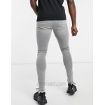 DESIGN Tall spray on jeans with power stretch in pale grey with knee rip and abrasions