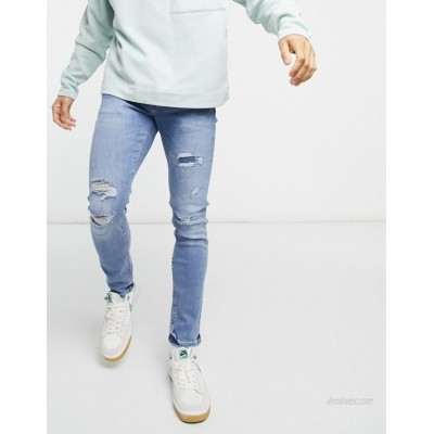 River Island skinny jeans with rips in light blue  