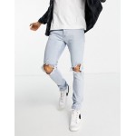 Topman stretch skinny extreme blow out rip jeans in light wash