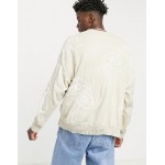 DESIGN oversized knit sweater with mushroom pattern in beige