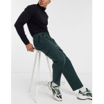 DESIGN oversized tapered smart pants in dark green with cargo pockets