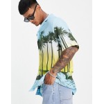 DESIGN relaxed fit longline shirt in tropical scenic print