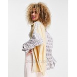 COLLUSION Unisex oversized shirt in spliced stripe