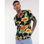DESIGN relaxed fit revere shirt in large scale black and yellow floral